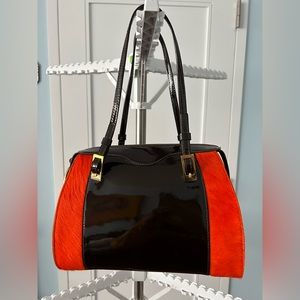 Shoulder rabbit fur handbag. Brown and orange. Like new. Colombian designer